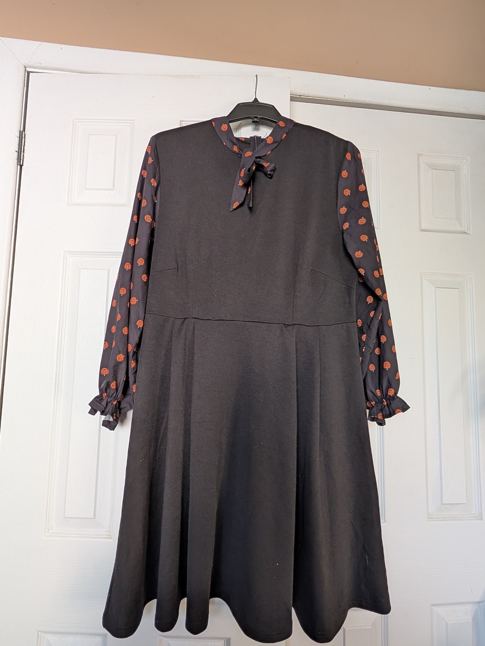 Black Long-Sleeve Tie-Neck Dress with Pumpkin Printed Sleeves